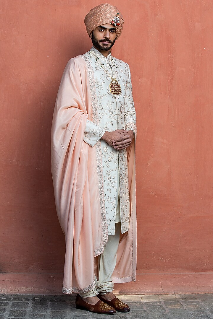 Ivory Raw Silk Embroidered Groom Sherwani Set by NITIKA GUJRAL MEN at Pernia's Pop Up Shop