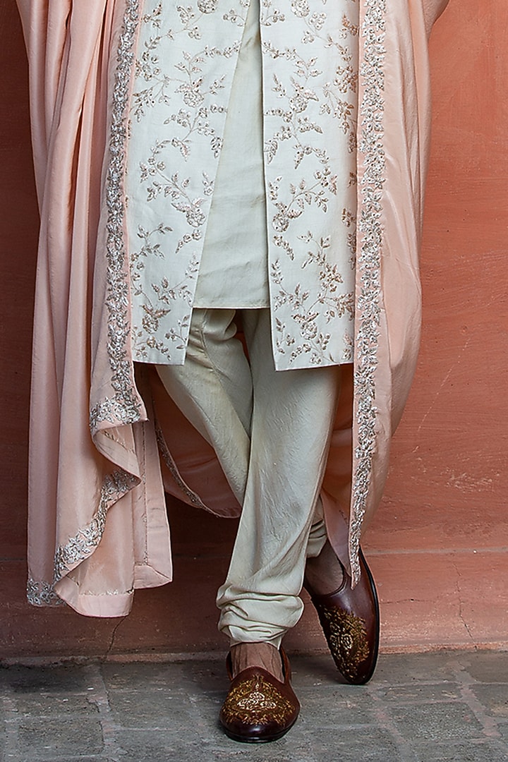Ivory Raw Silk Embroidered Groom Sherwani Set by NITIKA GUJRAL MEN at Pernia's Pop Up Shop