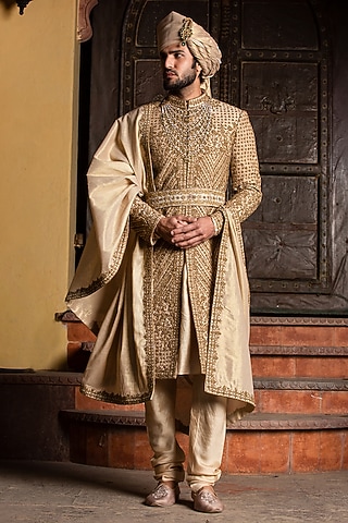 Gold Raw Silk Embroidered Sherwani Set by NITIKA GUJRAL MEN