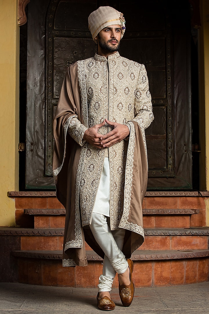 Beige Brown Raw Silk Embroidered Sherwani Set by NITIKA GUJRAL MEN