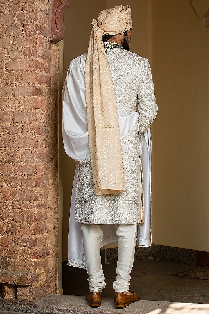 Ivory Taffeta Silk Embroidered Groom Sherwani Set by NITIKA GUJRAL MEN at Pernia's Pop Up Shop