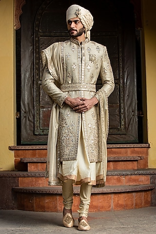 Gold Twill Matka Embroidered Sherwani Set by NITIKA GUJRAL MEN