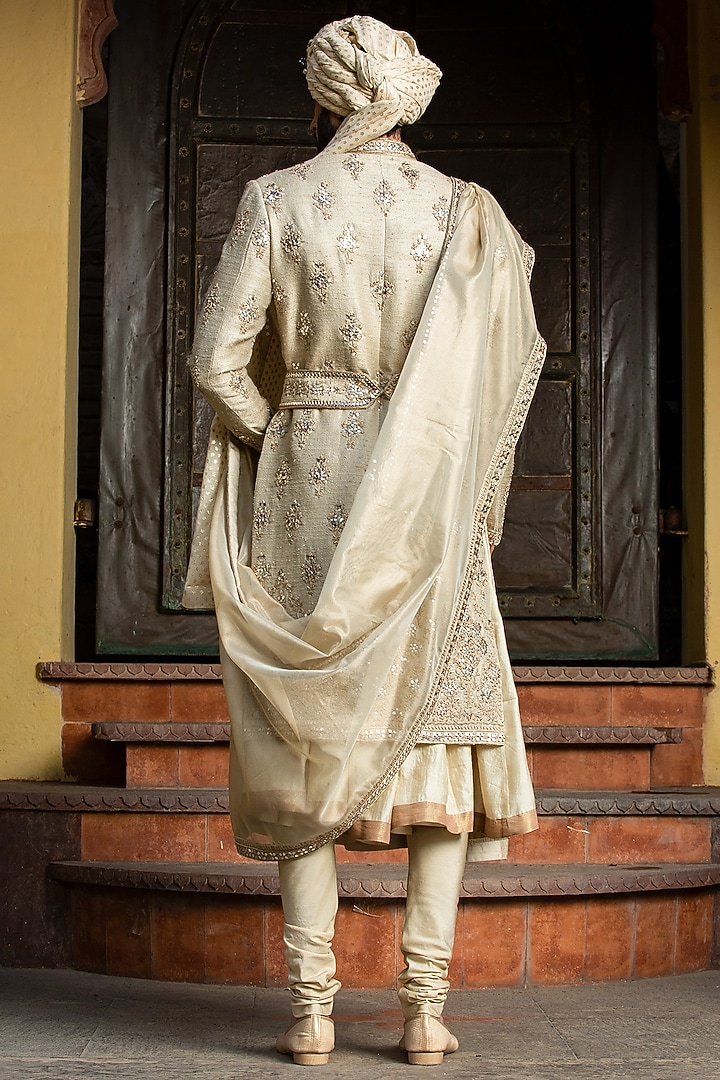Gold Twill Matka MIrror Embroidered Groom Sherwani Set by NITIKA GUJRAL MEN at Pernia's Pop Up Shop