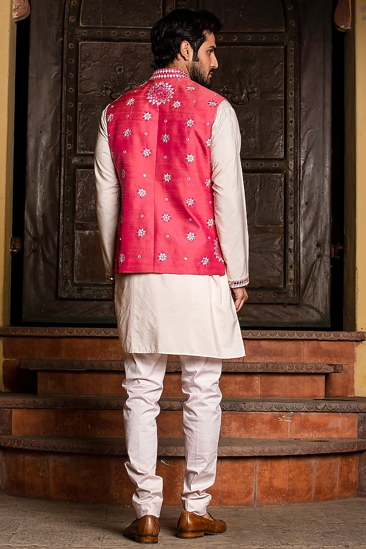 Coral Raw Silk Resham Embroidered Bundi Jacket Set by NITIKA GUJRAL MEN at Pernia's Pop Up Shop