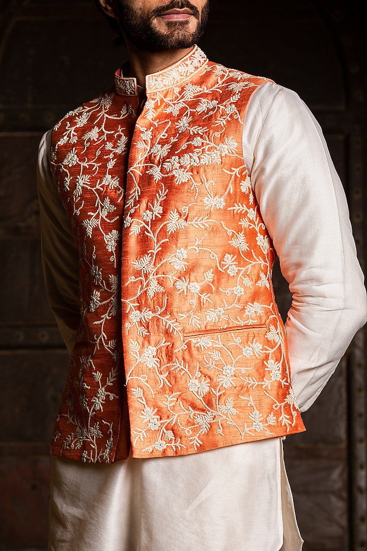 Orange Raw Silk Mirror Embroidered Bundi Jacket Set by NITIKA GUJRAL MEN at Pernia's Pop Up Shop