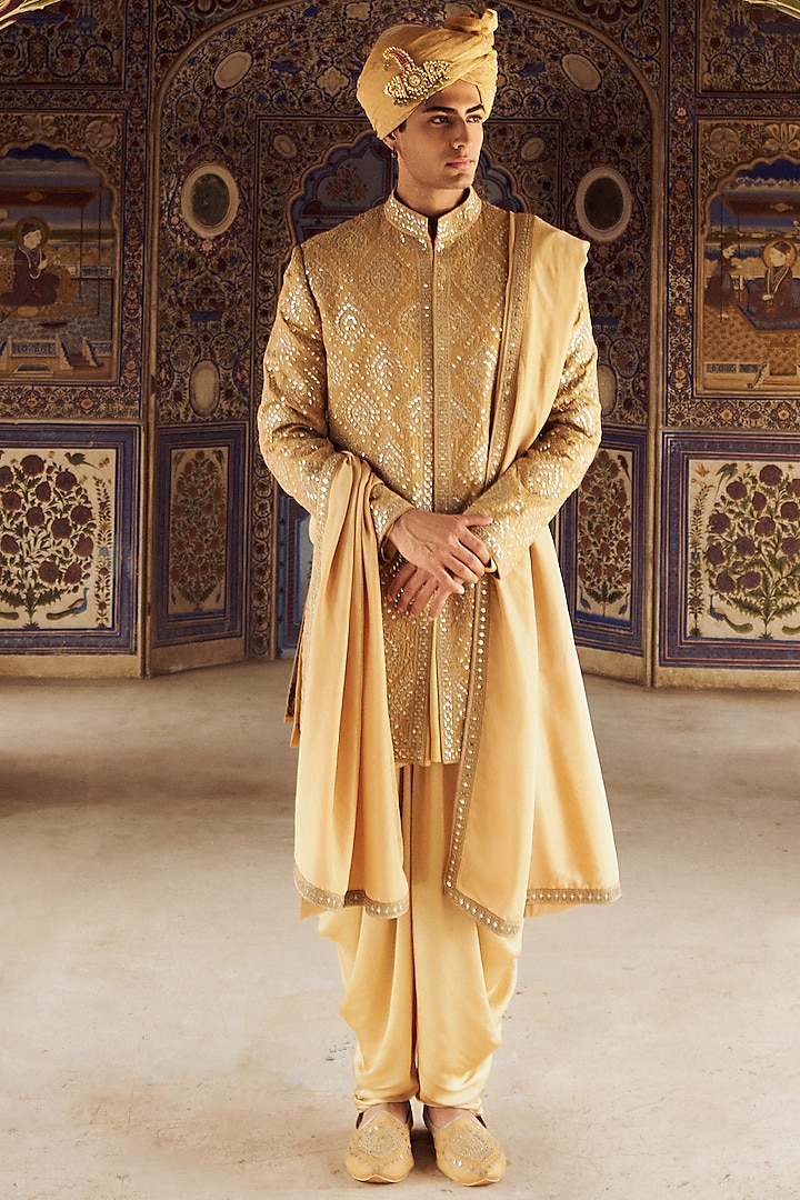 Gold Raw Silk Resham & Patra Work Sherwani Set by NITIKA GUJRAL MEN