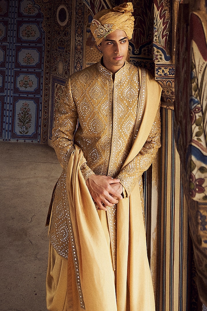 Gold Raw Silk Resham & Patra Work Groom Sherwani Set by NITIKA GUJRAL MEN at Pernia's Pop Up Shop