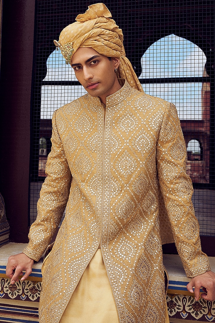 Gold Raw Silk Resham & Patra Work Groom Sherwani Set by NITIKA GUJRAL MEN at Pernia's Pop Up Shop