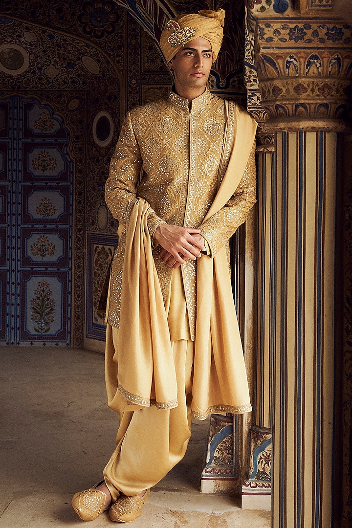 Gold Raw Silk Resham & Patra Work Groom Sherwani Set by NITIKA GUJRAL MEN at Pernia's Pop Up Shop