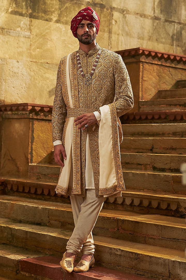 Gold Dupion Silk Cutdana Embroidered Sherwani Set by NITIKA GUJRAL MEN