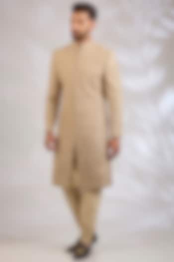 Champagne Raw Silk Resham Embroidered Groom Sherwani Set by NITIKA GUJRAL MEN at Pernia's Pop Up Shop