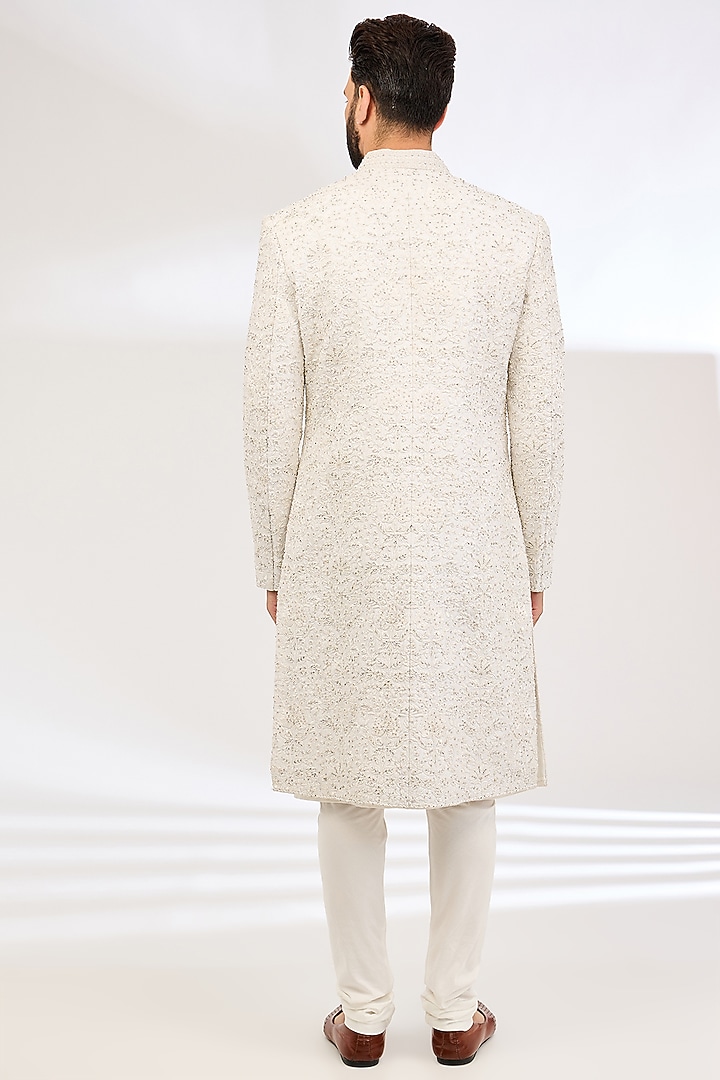 Ivory Raw Silk Embroidered Groom Sherwani Set by NITIKA GUJRAL MEN at Pernia's Pop Up Shop