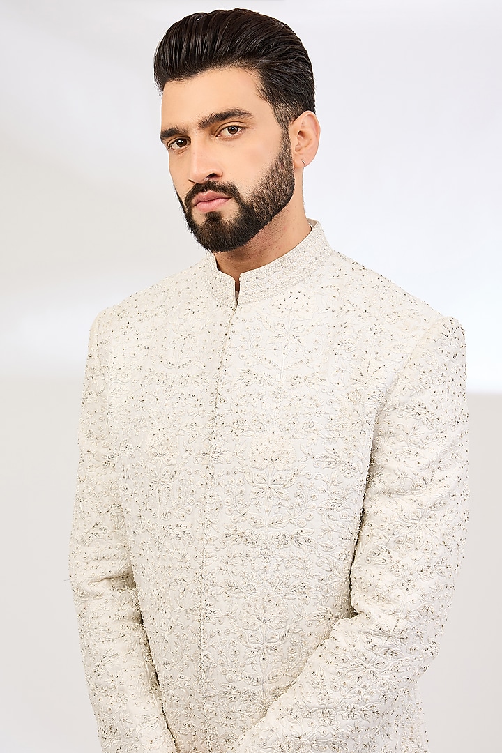 Ivory Raw Silk Embroidered Groom Sherwani Set by NITIKA GUJRAL MEN at Pernia's Pop Up Shop