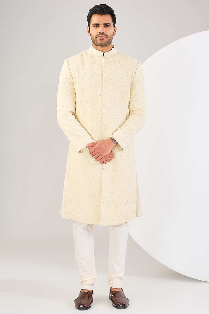 Ivory Raw Silk Dori Work & Pearl Embroidered Sherwani Set by NITIKA GUJRAL MEN