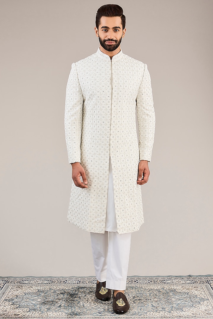 Ivory Raw Silk Resham & Cutdana Embroidered Sherwani Set by NITIKA GUJRAL MEN