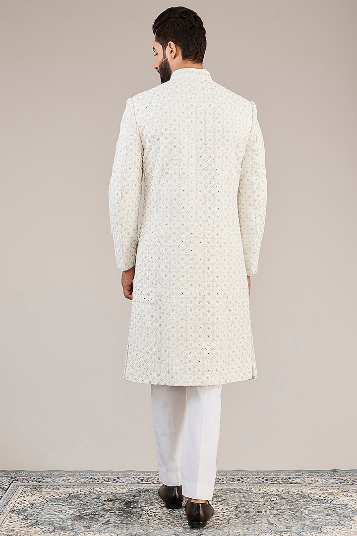 Ivory Raw Silk Resham & Cutdana Embroidered Groom Sherwani Set by NITIKA GUJRAL MEN at Pernia's Pop Up Shop