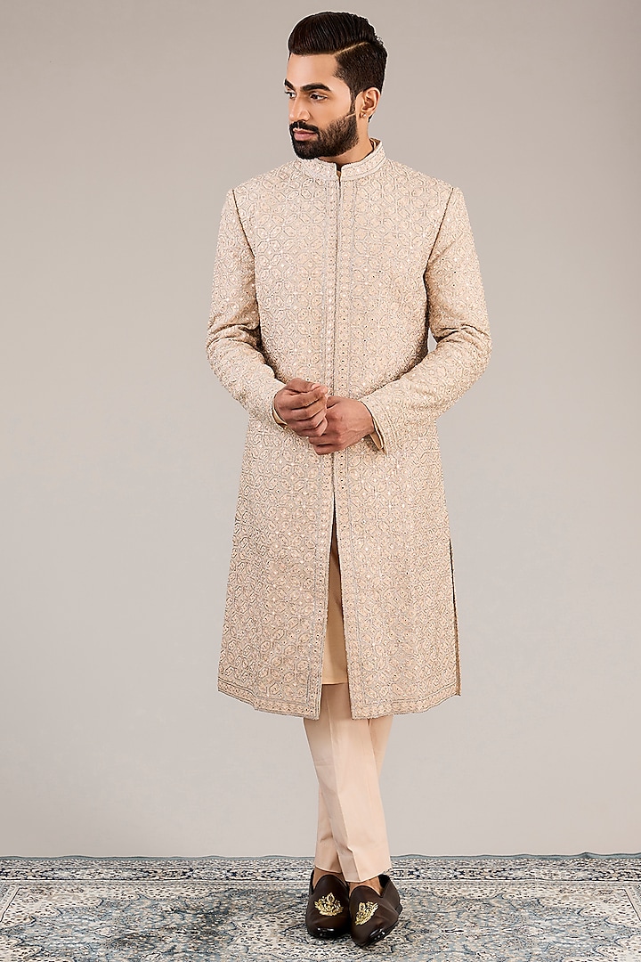 Peach Raw Silk Dabka & Mirror Embroidered Sherwani Set by NITIKA GUJRAL MEN