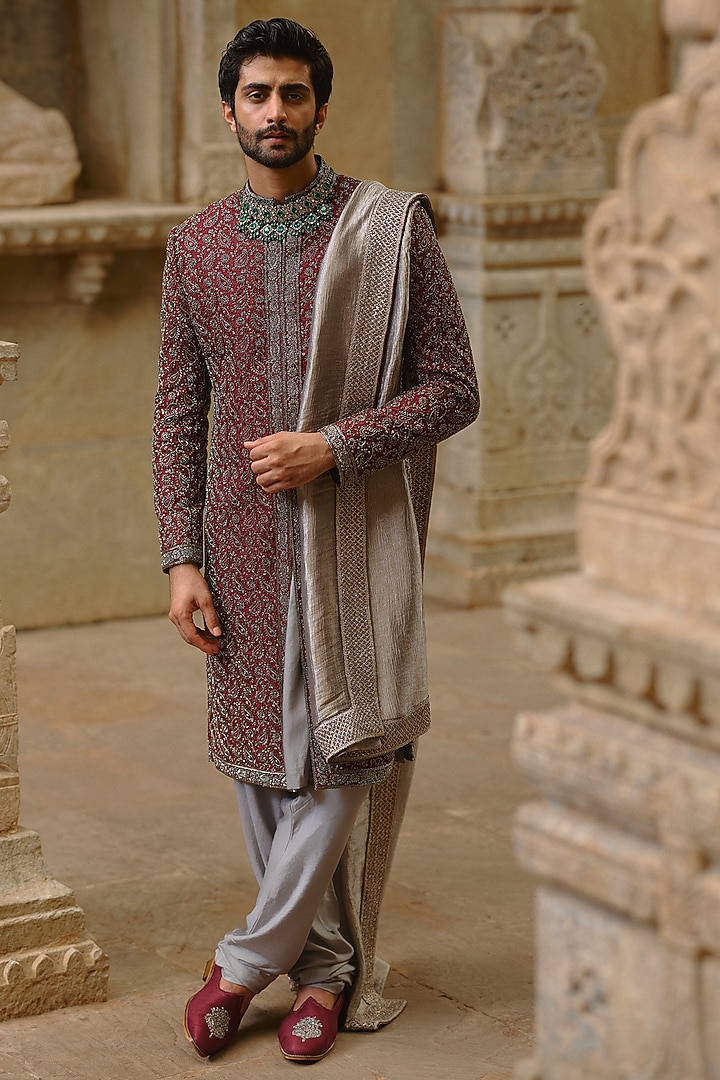 Burgundy Raw Silk Sequins Embroidered Sherwani Set by NITIKA GUJRAL MEN