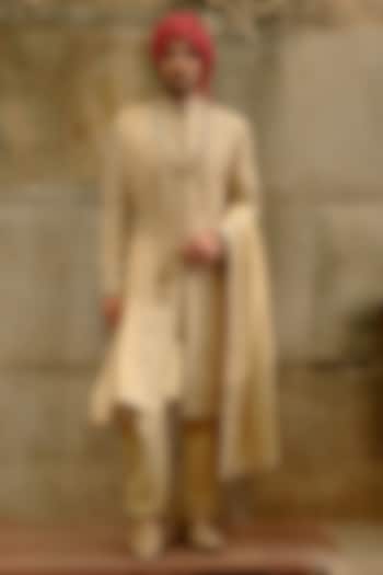 Gold Raw Silk Dabka Embroidered Sherwani Set by NITIKA GUJRAL MEN