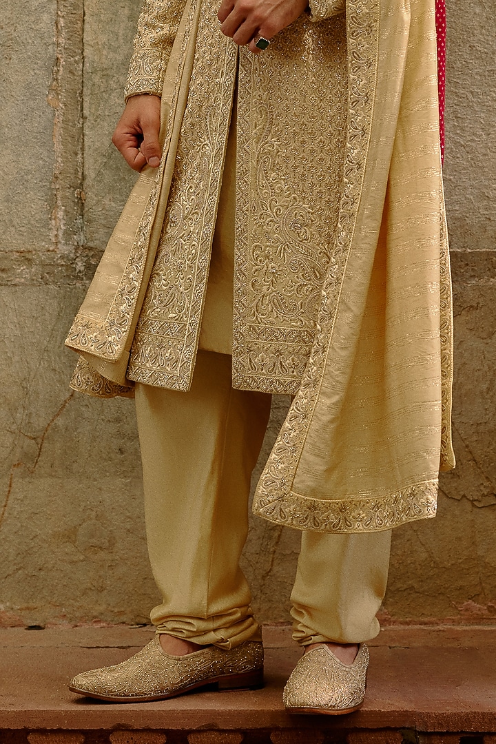 Gold Raw Silk Dabka Embroidered Groom Sherwani Set by NITIKA GUJRAL MEN at Pernia's Pop Up Shop