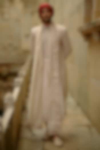 Cream Raw Silk Zari Embroidered Sherwani Set by NITIKA GUJRAL MEN