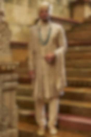 Cream Taffeta Resham Embroidered Groom Sherwani Set by NITIKA GUJRAL MEN at Pernia's Pop Up Shop