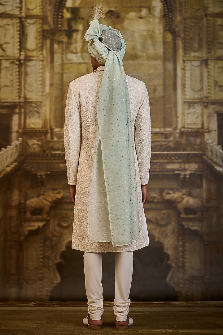 Ivory Raw Silk & Cotton Silk Cutdana Embroidered Groom Sherwani Set by NITIKA GUJRAL MEN at Pernia's Pop Up Shop