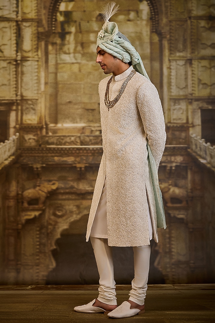 Ivory Raw Silk & Cotton Silk Cutdana Embroidered Groom Sherwani Set by NITIKA GUJRAL MEN at Pernia's Pop Up Shop