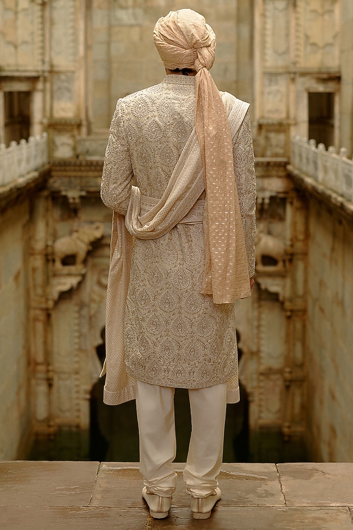 Light Beige Raw Silk Dabka Embroidered Groom Sherwani Set by NITIKA GUJRAL MEN at Pernia's Pop Up Shop