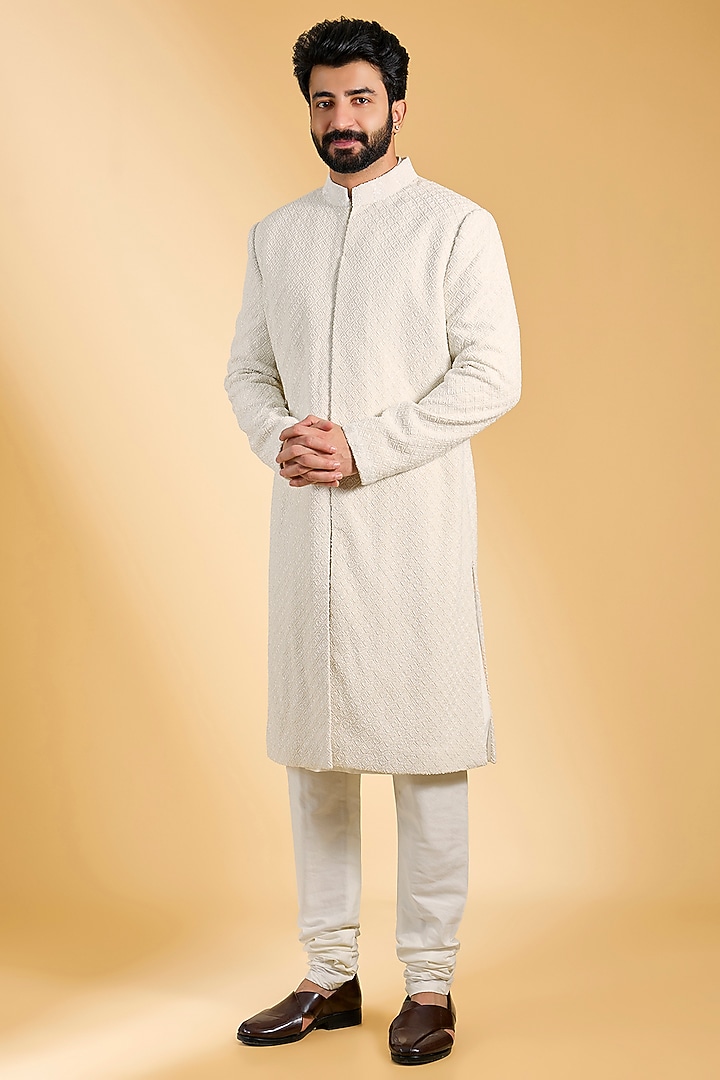 Ivory Raw Silk Dabka Embroidered Groom Sherwani Set by NITIKA GUJRAL MEN at Pernia's Pop Up Shop