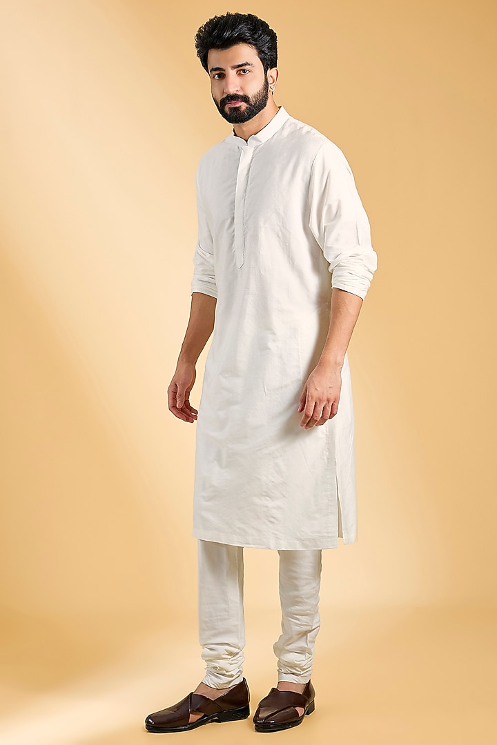 Ivory Raw Silk Dabka Embroidered Groom Sherwani Set by NITIKA GUJRAL MEN at Pernia's Pop Up Shop
