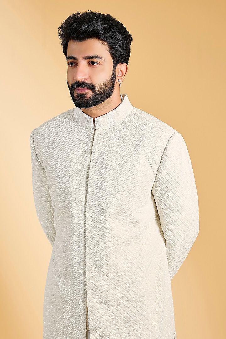 Ivory Raw Silk Dabka Embroidered Groom Sherwani Set by NITIKA GUJRAL MEN at Pernia's Pop Up Shop