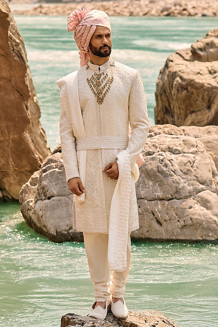 Ivory Raw Silk Resham Embroidered Groom Sherwani Set by NITIKA GUJRAL MEN at Pernia's Pop Up Shop