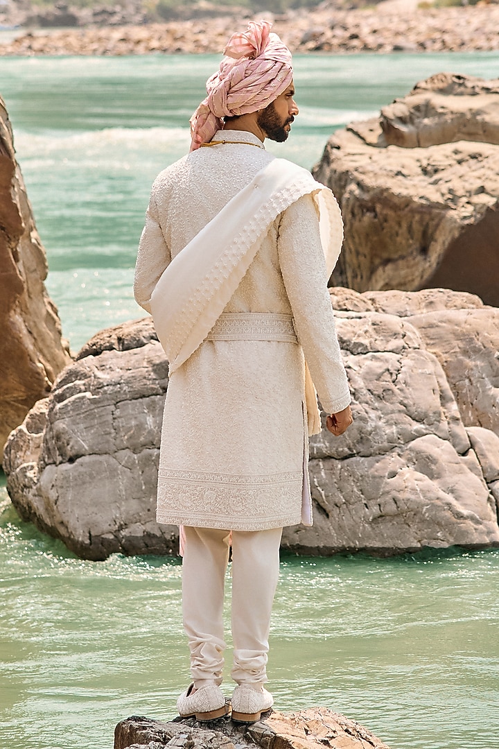Ivory Raw Silk Resham Embroidered Groom Sherwani Set by NITIKA GUJRAL MEN at Pernia's Pop Up Shop