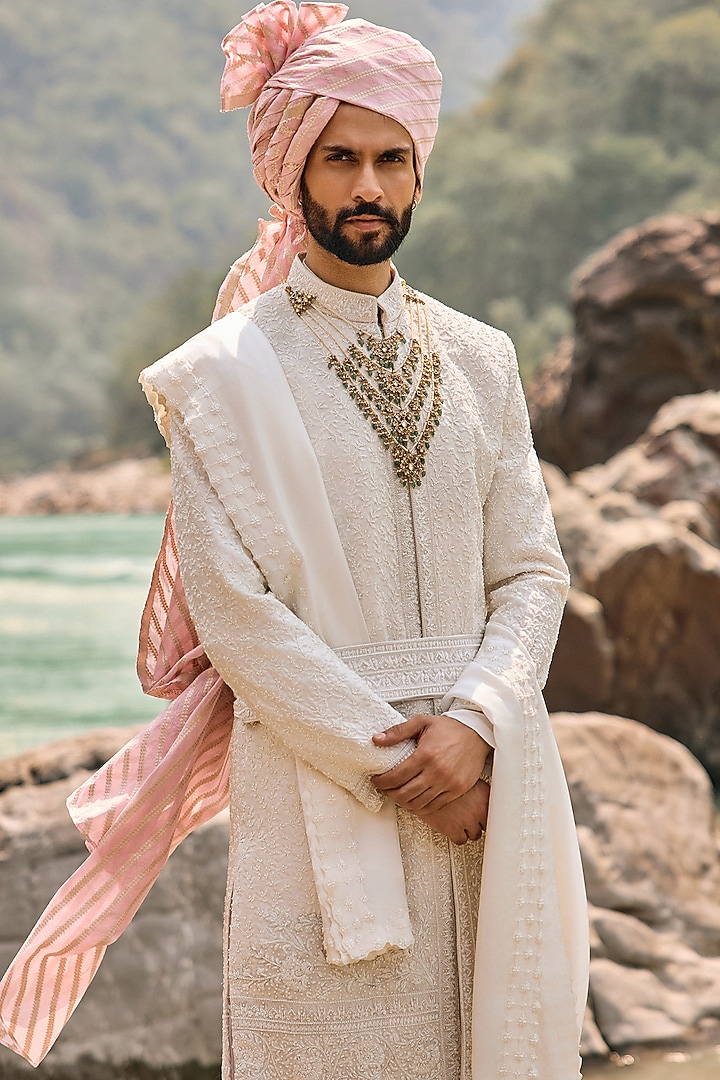 Ivory Raw Silk Resham Embroidered Groom Sherwani Set by NITIKA GUJRAL MEN at Pernia's Pop Up Shop