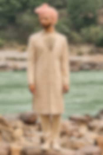 Champagne Gold Raw Silk Resham Embroidered Groom Sherwani Set by NITIKA GUJRAL MEN at Pernia's Pop Up Shop