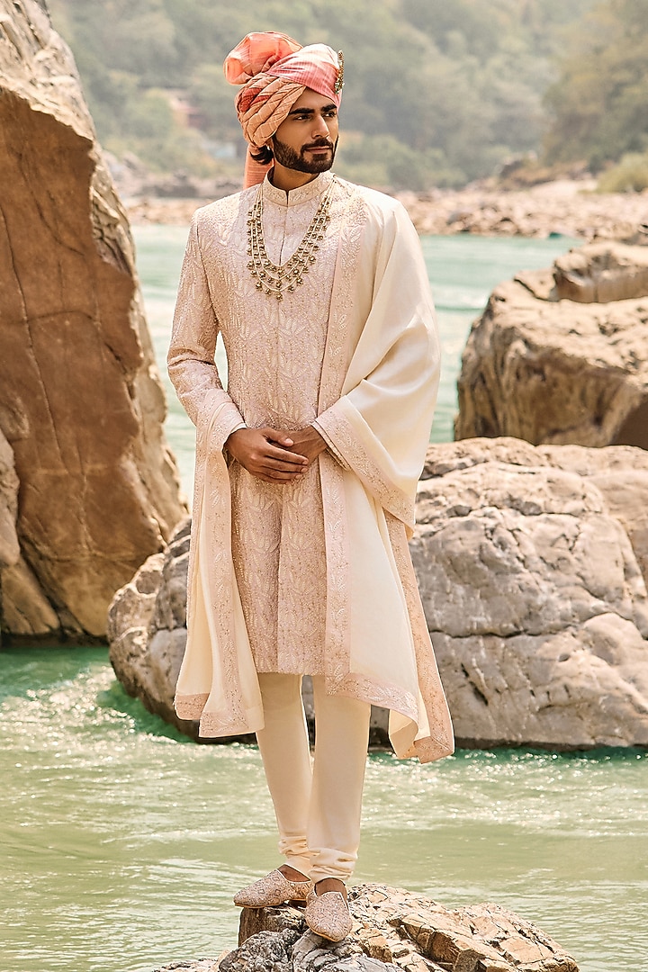 Blush Pink Raw Silk Resham Embroidered Groom Sherwani Set by NITIKA GUJRAL MEN at Pernia's Pop Up Shop