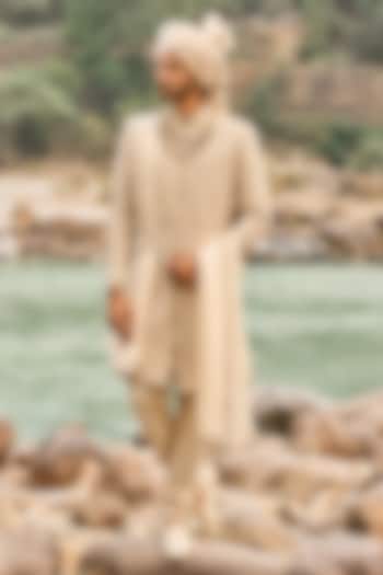 Beige Raw Silk Dori Embroidered Groom Sherwani Set by NITIKA GUJRAL MEN at Pernia's Pop Up Shop