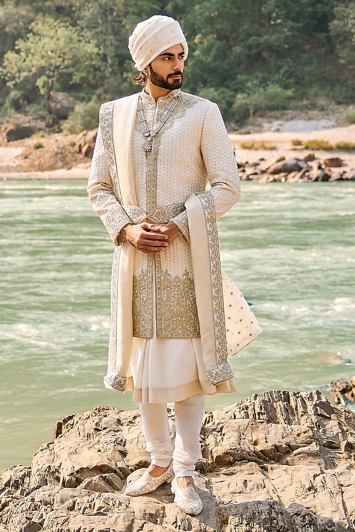 Ivory Raw Silk Resham Embroidered Groom Sherwani Set by NITIKA GUJRAL MEN at Pernia's Pop Up Shop