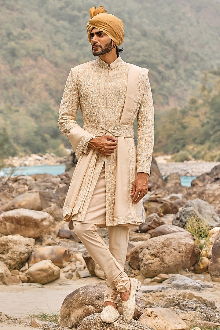 Soft Peach Raw Silk Cutdana Embroidered Groom Sherwani Set by NITIKA GUJRAL MEN at Pernia's Pop Up Shop