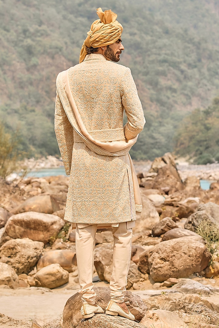 Soft Peach Raw Silk Cutdana Embroidered Groom Sherwani Set by NITIKA GUJRAL MEN at Pernia's Pop Up Shop