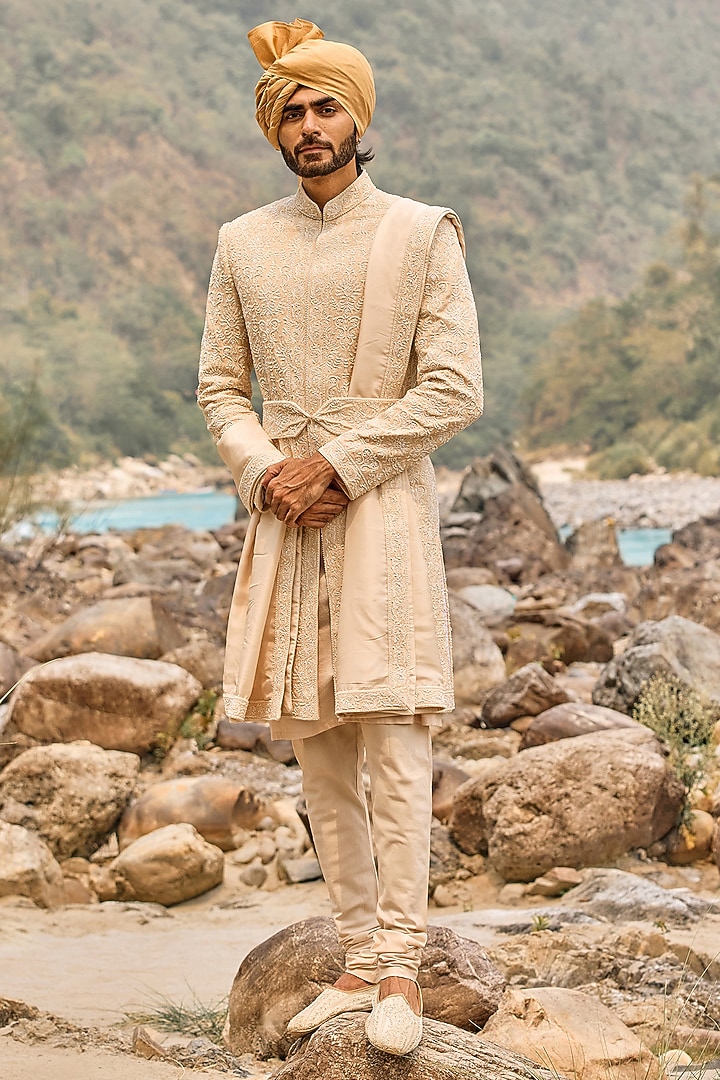 Soft Peach Raw Silk Cutdana Embroidered Groom Sherwani Set by NITIKA GUJRAL MEN at Pernia's Pop Up Shop