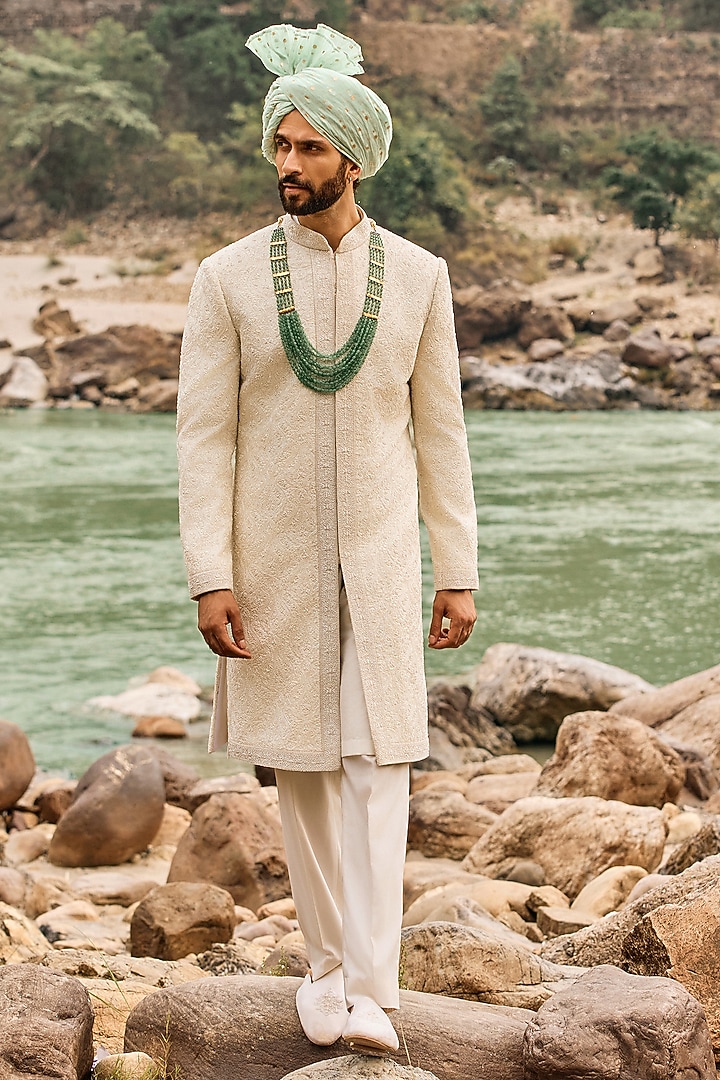 Ivory Raw Silk Resham Embroidered Groom Sherwani Set by NITIKA GUJRAL MEN at Pernia's Pop Up Shop