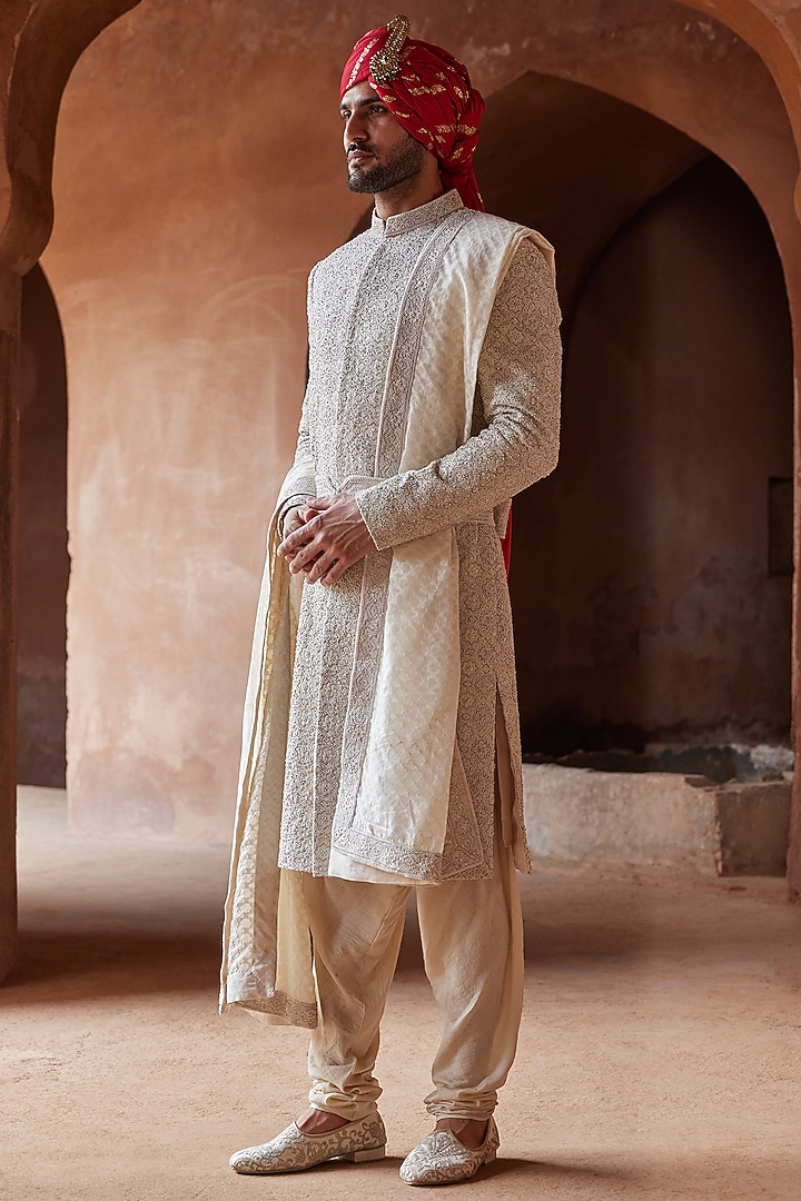 Ivory Raw Silk Embroidered Groom Sherwani Set by NITIKA GUJRAL MEN at Pernia's Pop Up Shop