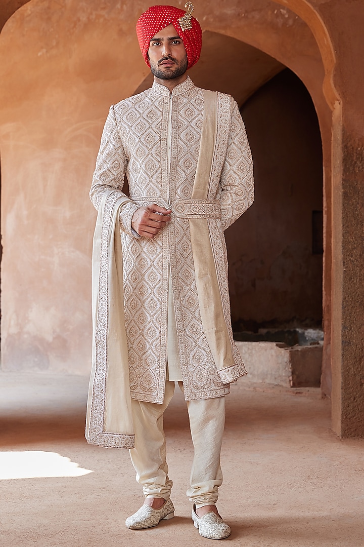 Ivory Taffeta Silk Embroidered Sherwani Set by NITIKA GUJRAL MEN