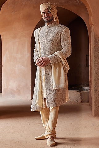 Mustard Matka Silk Embroidered Sherwani Set by NITIKA GUJRAL MEN