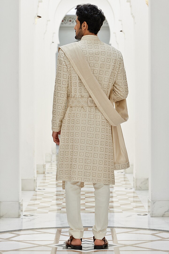 Cream Raw Silk Dabka & Sequins Embroidered Groom Sherwani Set by NITIKA GUJRAL MEN at Pernia's Pop Up Shop