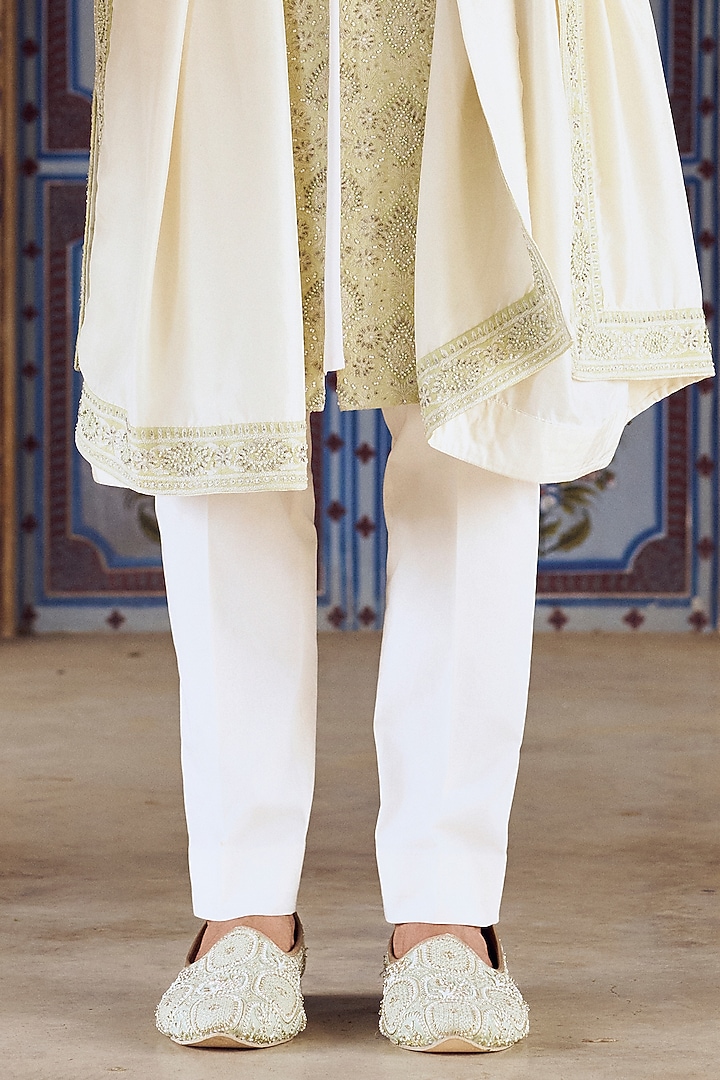 Mint Green Raw Silk Resham & Bead Embroidered Groom Sherwani Set by NITIKA GUJRAL MEN at Pernia's Pop Up Shop
