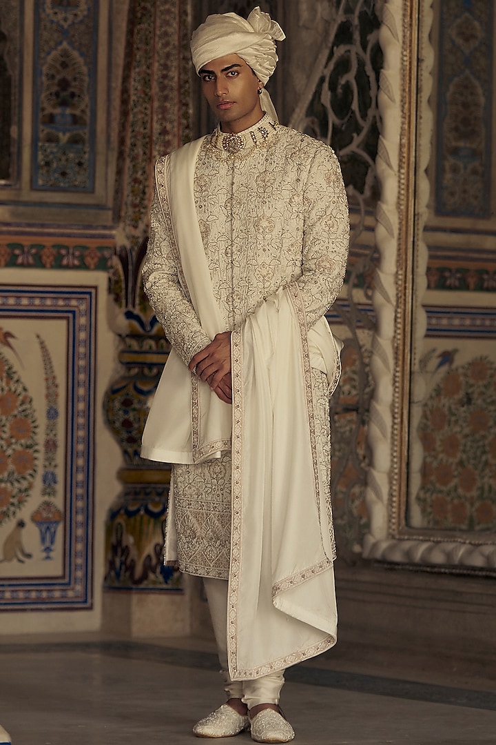 Ivory & Beige Raw Silk Dabka & Crystal Embroidered Sherwani Set by NITIKA GUJRAL MEN