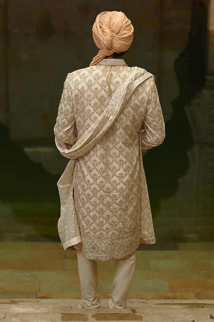 Ivory Taffeta Silk & Tissue Dabka Embroidered Groom Sherwani Set by NITIKA GUJRAL MEN at Pernia's Pop Up Shop